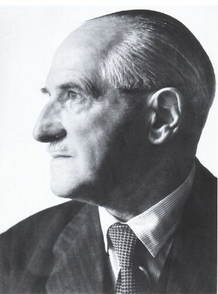 Friedrich A. Paneth An older man in a suit and tie, photographed from the side, with the focus on his head and shoulders.