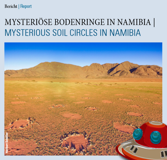 Newsletter Deckblatt 3/2017. Bodenringe in Namibias Landschaft, Berge im Hintergrund.