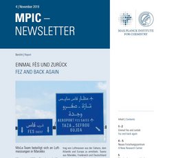 MPIC Newsletter cover from November 2019 with a blue road sign directing to Fes, Taza, Sefrou, and Oujda.