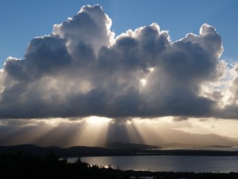 Scientists have been able to decipher how organic acids are formed in the atmosphere. Among other things, this could help to better understand the formation of clouds and aerosol particles. blue sky with huge, impressive clouds and distinctive sun rays shining from behind