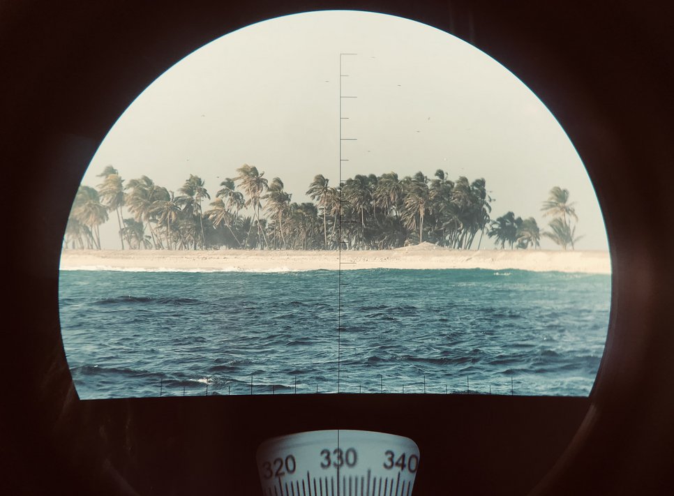 Nic's and Alan’s first view of Clipperton Atoll upon arriving. The atoll is small, spanning only several km in diameter, and has no inhabitants.